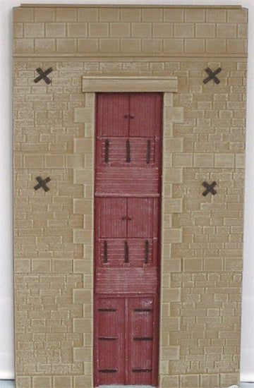 3-storey stone mill/warehouse building facade with warehouse doors to each floor UNPAINTED